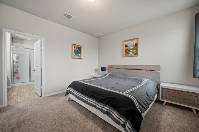 bedroom featuring light carpet