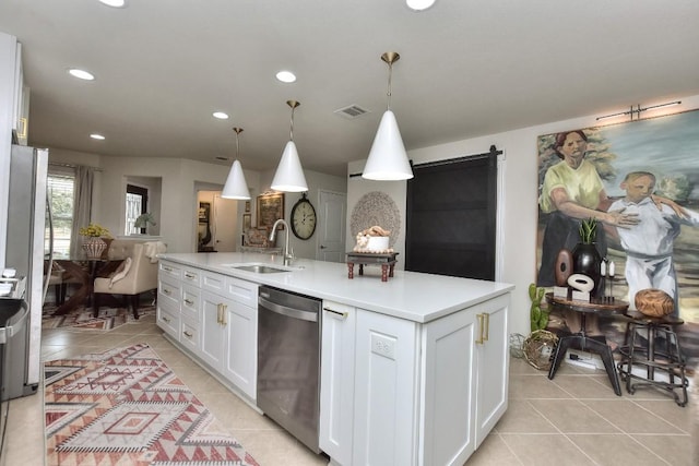 kitchen with white cabinetry, dishwasher, sink, and decorative light fixtures