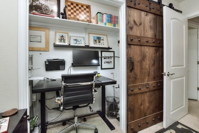 office area featuring a barn door