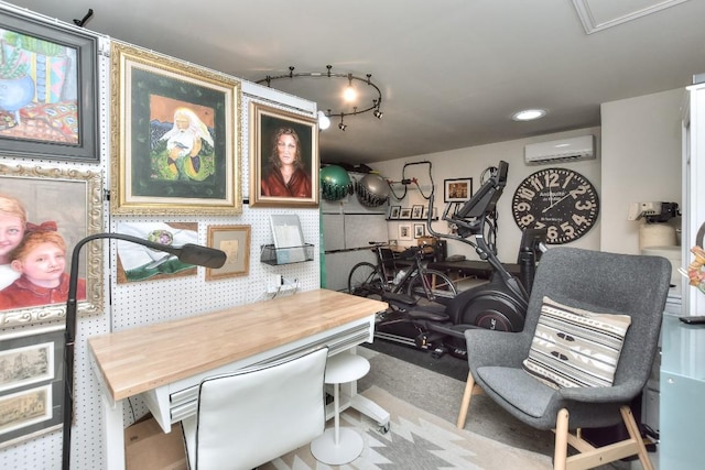 dining area featuring track lighting and an AC wall unit