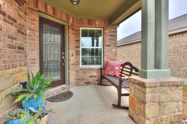 property entrance featuring covered porch