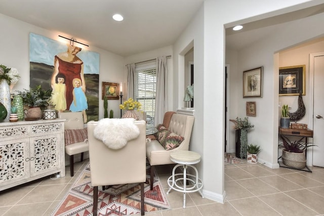 sitting room with light tile patterned floors