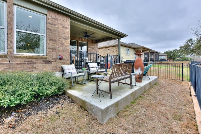 view of patio / terrace featuring ceiling fan