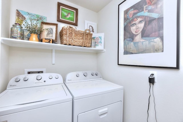 laundry room featuring washer and clothes dryer