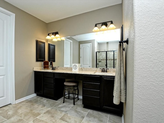 1533 Cresson Trl, Leander, TX 78641 - bathroom featuring double vanity, a stall shower, tile patterned flooring, and baseboards