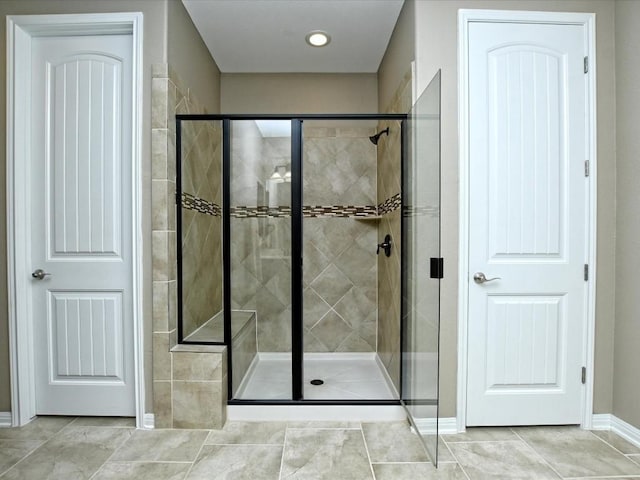 1533 Cresson Trl, Leander, TX 78641 - bathroom with a stall shower and baseboards