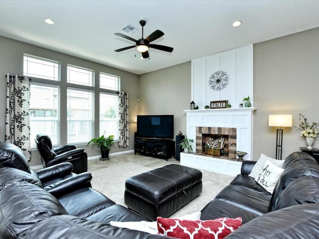 1533 Cresson Trl, Leander, TX 78641 - living area with a ceiling fan, recessed lighting, and a tiled fireplace