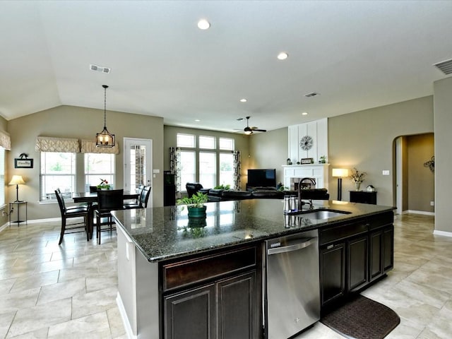 1533 Cresson Trl, Leander, TX 78641 - kitchen with stainless steel dishwasher, a sink, a ceiling fan, plenty of natural light, and recessed lighting