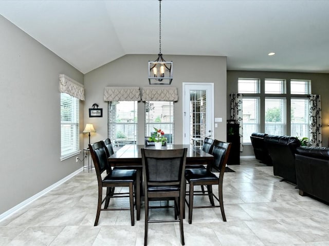 1533 Cresson Trl, Leander, TX 78641 - dining area with a chandelier, lofted ceiling, and baseboards