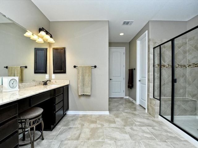 1533 Cresson Trl, Leander, TX 78641 - full bathroom featuring vanity, a stall shower, and baseboards