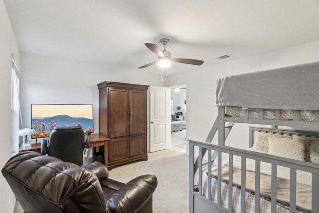 carpeted bedroom featuring ceiling fan