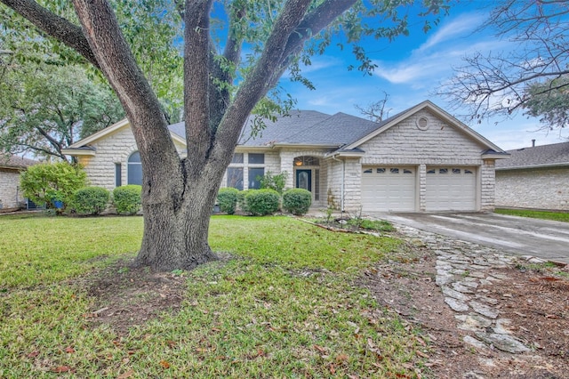 ranch-style house with a garage and a front lawn