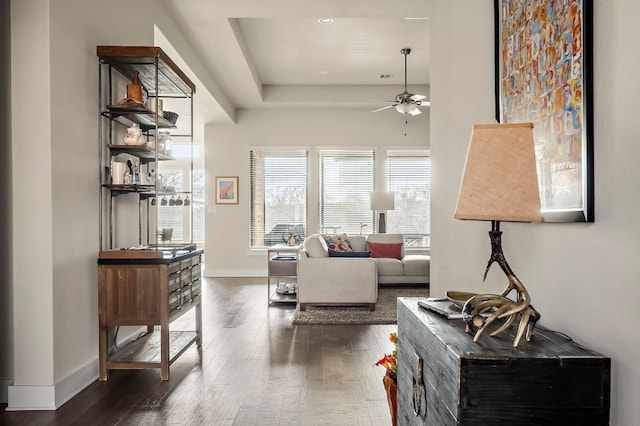 living room featuring dark wood-type flooring, recessed lighting, ceiling fan, and baseboards