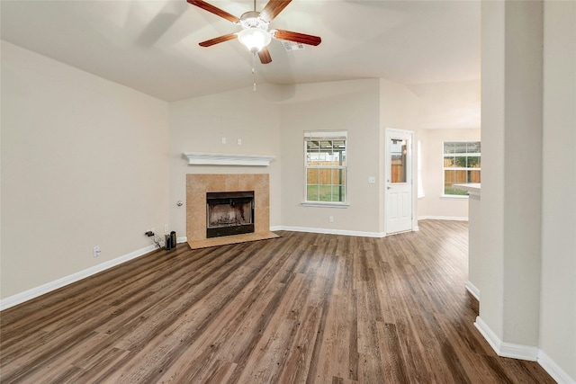 18825 Golden Eagle Way, Elgin, TX 78621 - unfurnished living room featuring wood finished floors, ceiling fan, lofted ceiling, and a fireplace