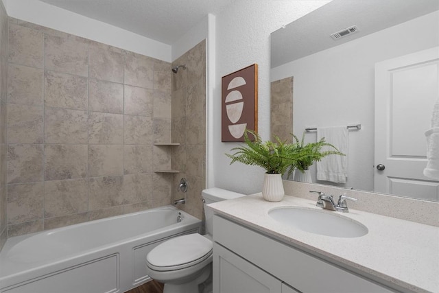 501 Bluejack Way, Hutto, TX 78634 - bathroom with vanity, toilet, and bathing tub / shower combination
