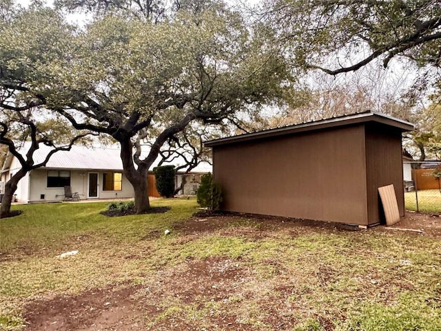 803 Castle Ridge Rd, Austin, TX 78746 - view of grassy yard with an outbuilding