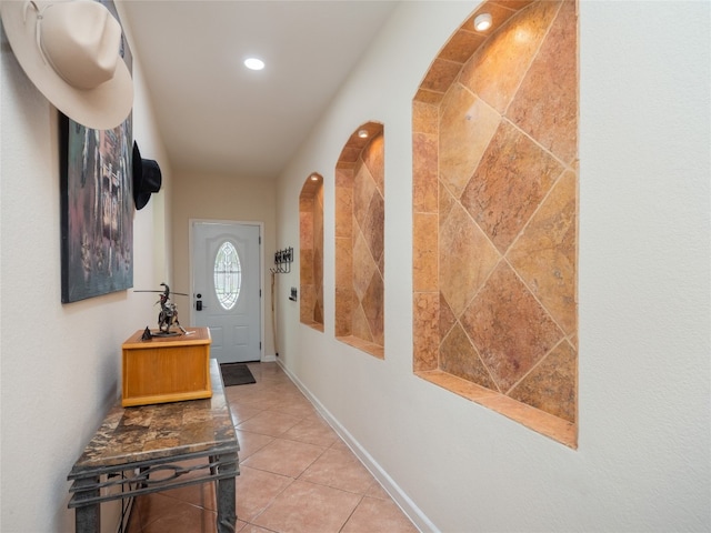 entryway featuring light tile patterned floors