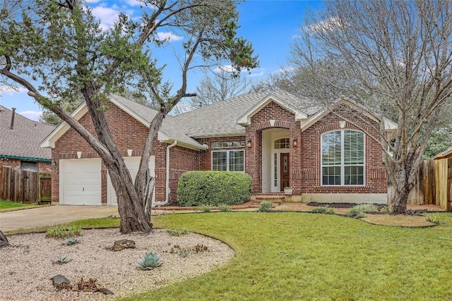 view of front of property with a garage and a front lawn