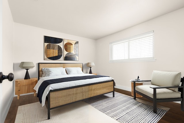 bedroom with hardwood / wood-style floors