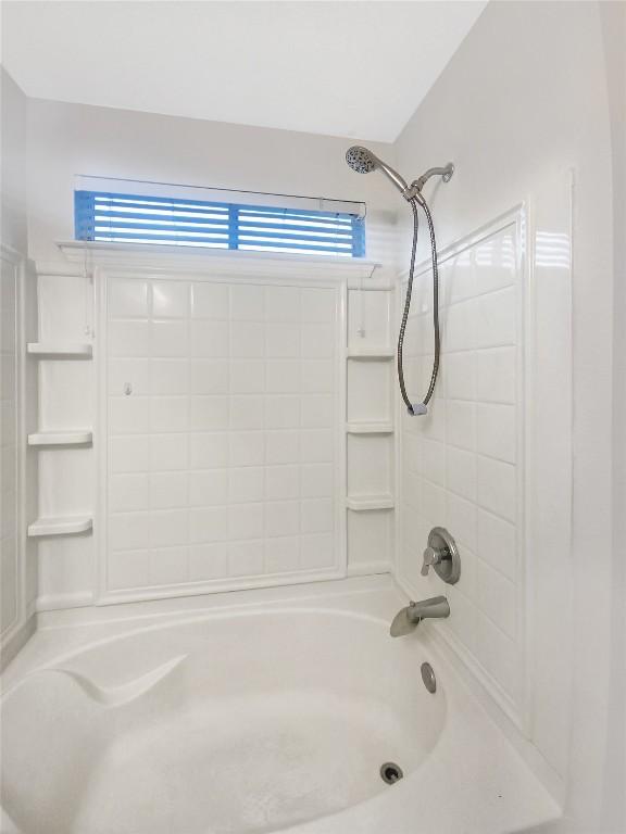 full bath with shower / bathing tub combination