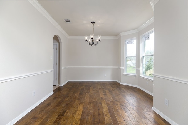 2901 Cashell Wood Dr, Cedar Park, TX 78613 - spare room featuring arched walkways, a chandelier, dark wood-style floors, crown molding, and baseboards