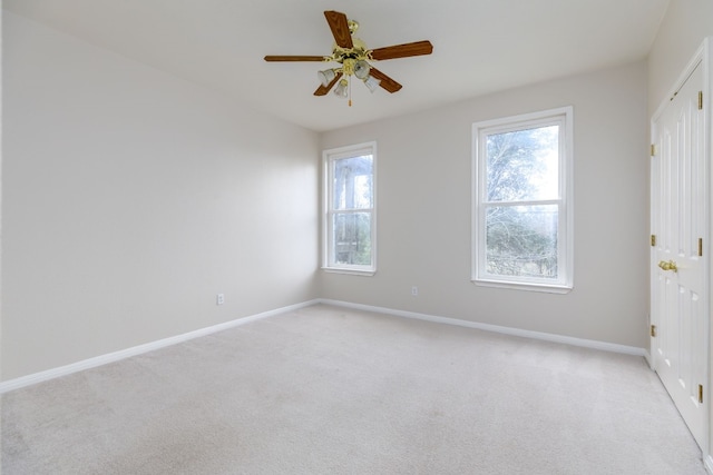 2901 Cashell Wood Dr, Cedar Park, TX 78613 - empty room featuring light carpet, baseboards, and ceiling fan