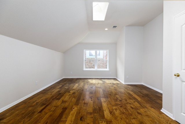 2901 Cashell Wood Dr, Cedar Park, TX 78613 - bonus room featuring a skylight, dark wood-style flooring, lofted ceiling, and baseboards