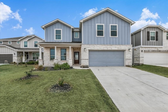 3 Pacific Loon St, Leander, TX 78641 - view of front facade with stone siding, board and batten siding, a garage, driveway, and a front yard