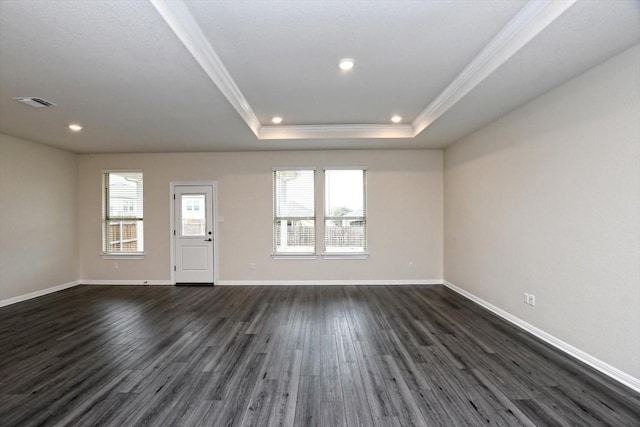 3 Pacific Loon St, Leander, TX 78641 - unfurnished living room with ornamental molding, healthy amount of natural light, dark wood-style flooring, recessed lighting, and a raised ceiling