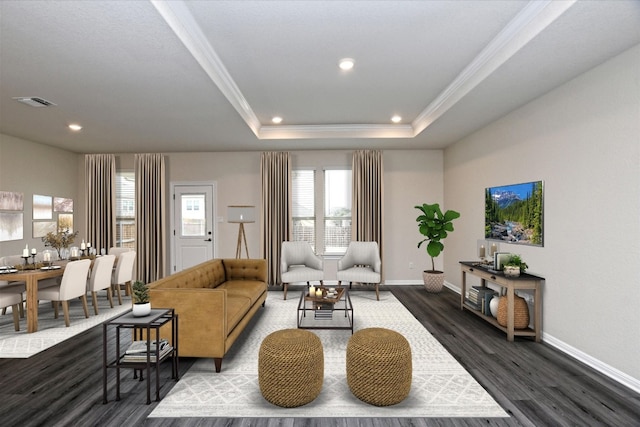 3 Pacific Loon St, Leander, TX 78641 - living room featuring plenty of natural light, ornamental molding, dark wood finished floors, recessed lighting, and a raised ceiling