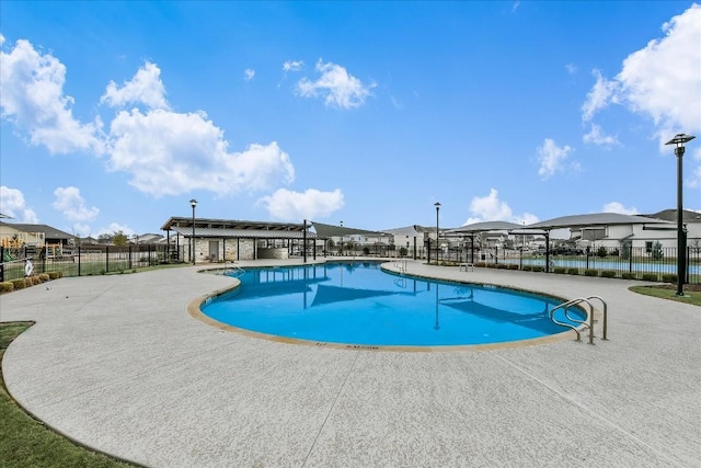3 Pacific Loon St, Leander, TX 78641 - community pool featuring a patio and a residential view