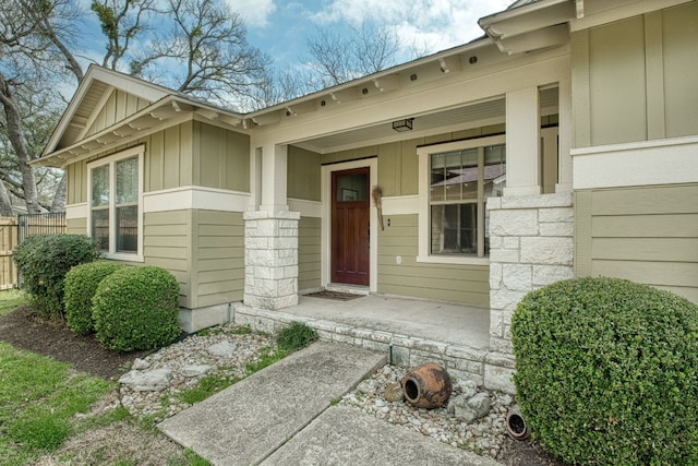 property entrance with covered porch