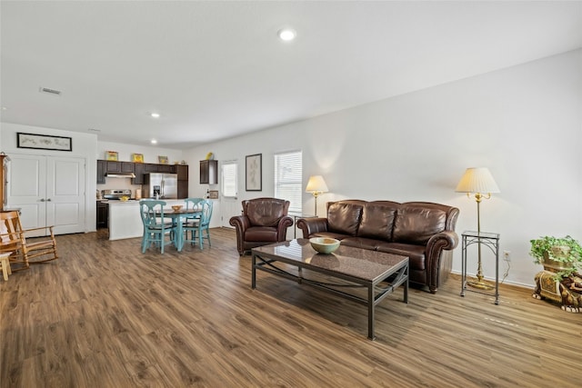 living room with hardwood / wood-style flooring