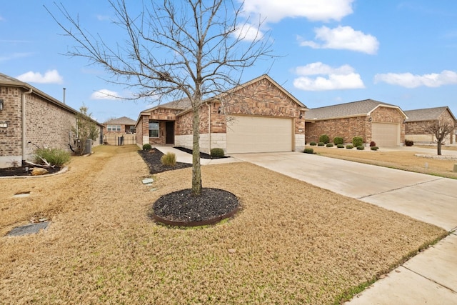 view of front of home with a garage and a front lawn