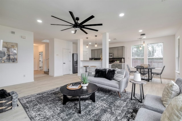 13701 Glen Mark Dr, Manor, TX 78653 - living room featuring a ceiling fan, light wood-style floors, and recessed lighting