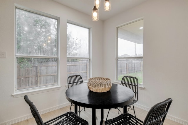 13701 Glen Mark Dr, Manor, TX 78653 - dining area with baseboards and light wood-style flooring