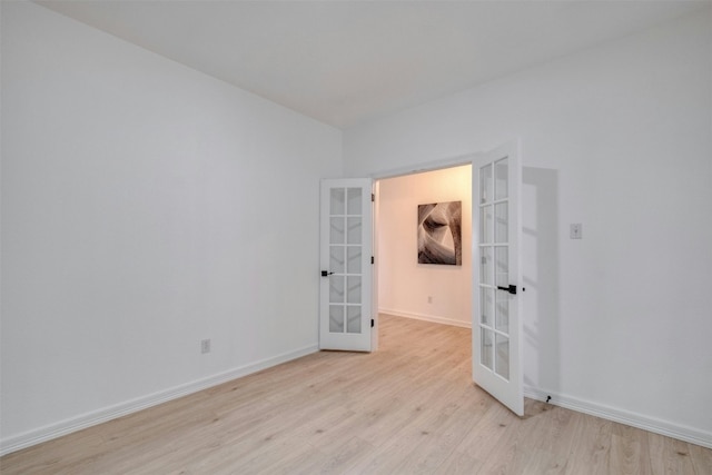 13701 Glen Mark Dr, Manor, TX 78653 - spare room featuring french doors and light wood-type flooring