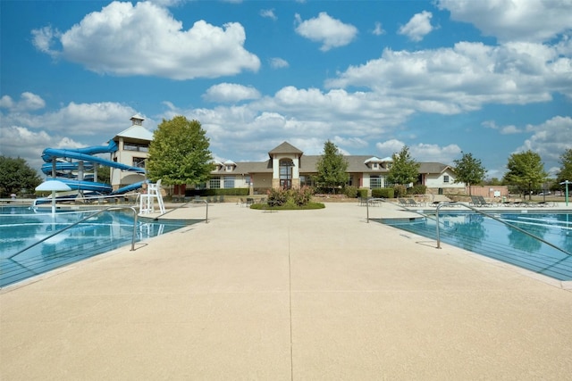 13701 Glen Mark Dr, Manor, TX 78653 - community pool with a patio and a water slide
