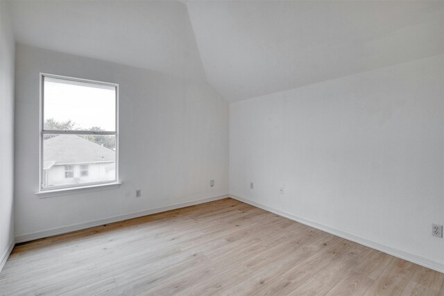 13701 Glen Mark Dr, Manor, TX 78653 - bonus room featuring light wood-style flooring and lofted ceiling
