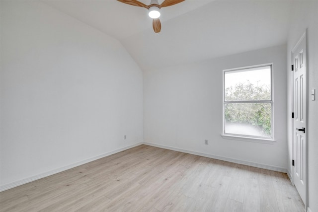 13701 Glen Mark Dr, Manor, TX 78653 - spare room with light wood-style floors, a ceiling fan, and vaulted ceiling