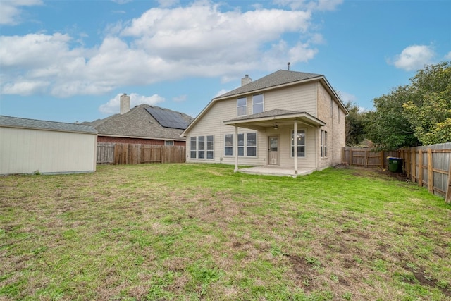 13701 Glen Mark Dr, Manor, TX 78653 - rear view of house with a ceiling fan, a patio area, and a fenced backyard