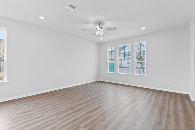 336 Blue Oasis Ln, Leander, TX 78641 - empty room with wood finished floors, recessed lighting, baseboards, and ceiling fan