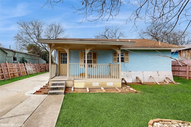 view of front of property with a front lawn and a porch