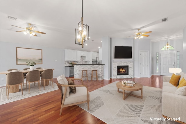 30388 Ledgemont Ln, Georgetown, TX 78628 - living room with a ceiling fan, visible vents, light wood-style flooring, and baseboards