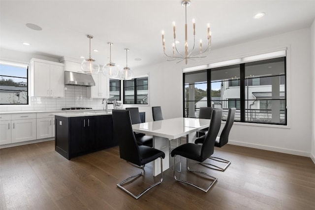 705 Ariana Ct, Austin, TX 78746 - dining space featuring dark wood-style flooring, recessed lighting, a chandelier, and baseboards