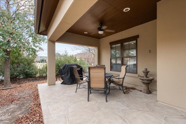 view of patio featuring grilling area and ceiling fan