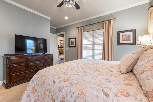 bedroom featuring crown molding, carpet floors, and ceiling fan