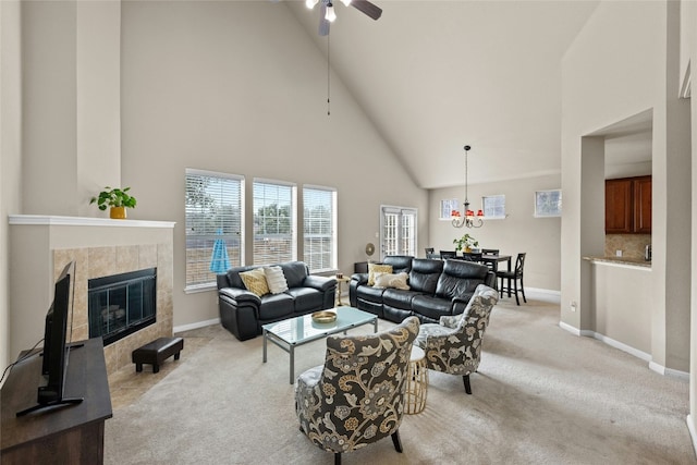 11000 Anderson Mill Rd Unit 100, Austin, TX 78750 - living area with high vaulted ceiling, baseboards, light carpet, ceiling fan, and a fireplace