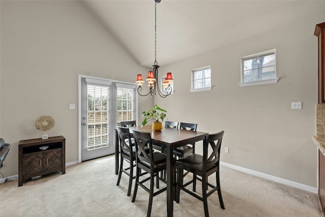 11000 Anderson Mill Rd Unit 100, Austin, TX 78750 - dining space featuring a chandelier, light carpet, baseboards, and vaulted ceiling
