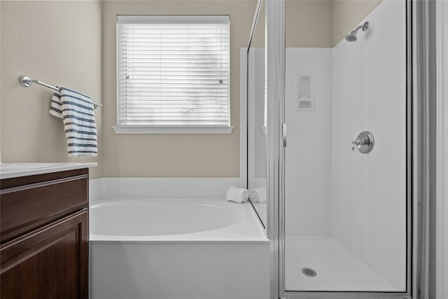 11000 Anderson Mill Rd Unit 100, Austin, TX 78750 - full bathroom featuring a garden tub, a stall shower, and vanity